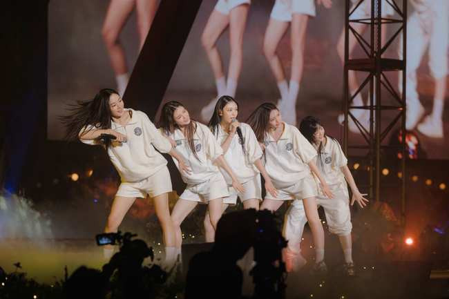 NewJeans Unveils Addictive New Track 'ETA' at Fan Meeting, Anticipates Music Chart Domination